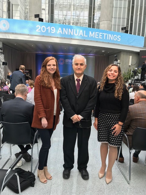 2 students and a professor at the world bank